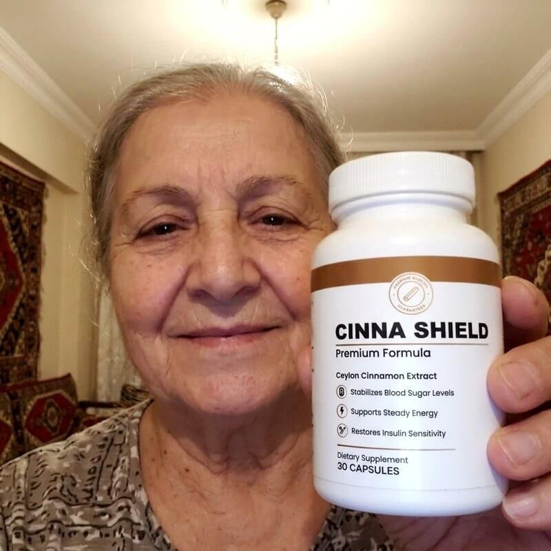 Cinna Shield customer holding their bottle