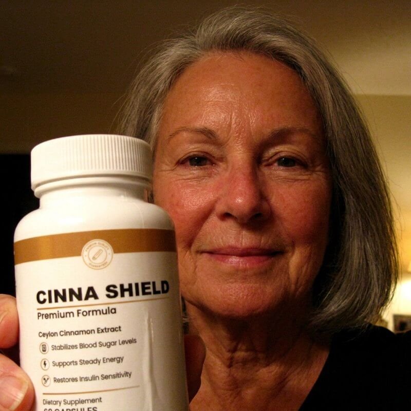 Cinna Shield customer holding their bottle