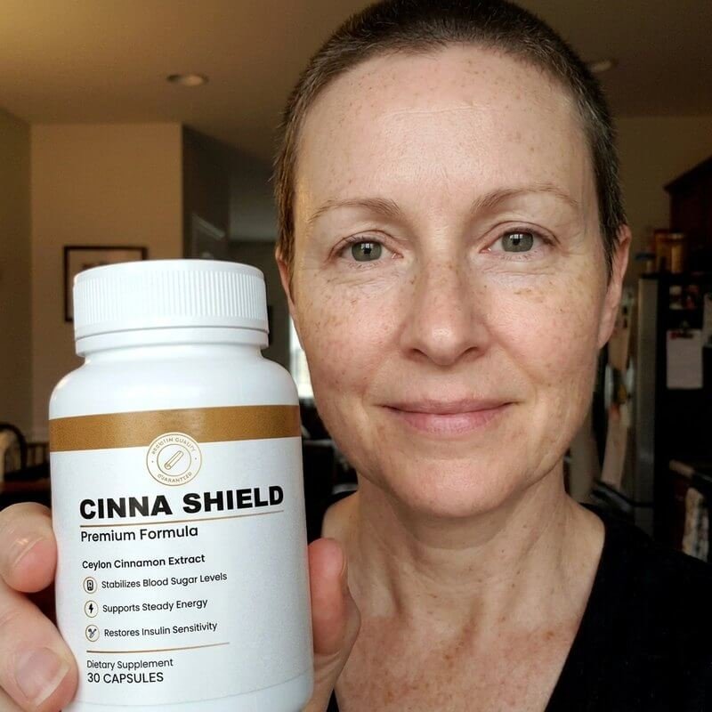 Cinna Shield customer holding their bottle